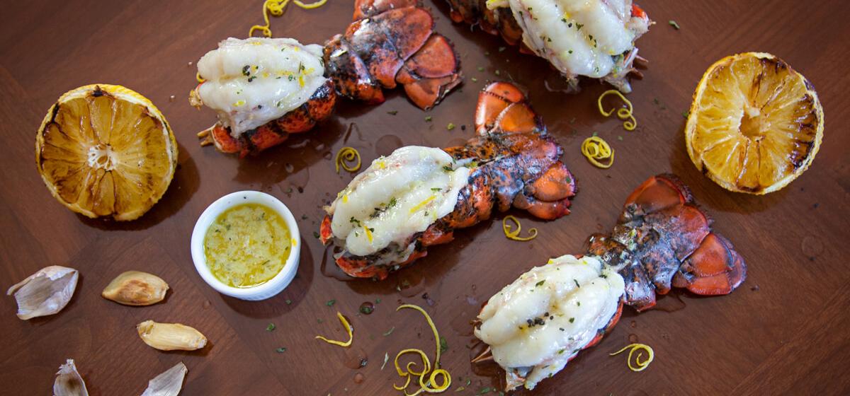 BBQ LOBSTER TAILS WITH GRILLED LEMONS & GARLIC